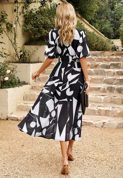 Femme Robe Midi à Imprimé Floral avec Col en V et Manches Bouffantes