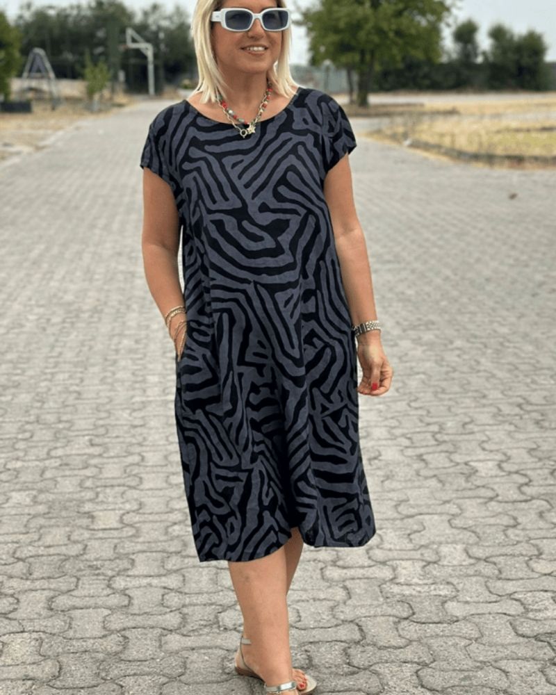 Femme Robe Midi Manches Courtes Col Rond à Imprimé Zébré avec Poches