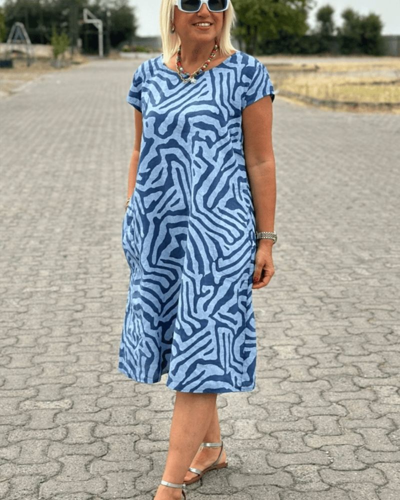 Femme Robe Midi Manches Courtes Col Rond à Imprimé Zébré avec Poches