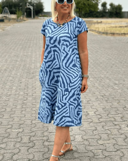 Femme Robe Midi Manches Courtes Col Rond à Imprimé Zébré avec Poches