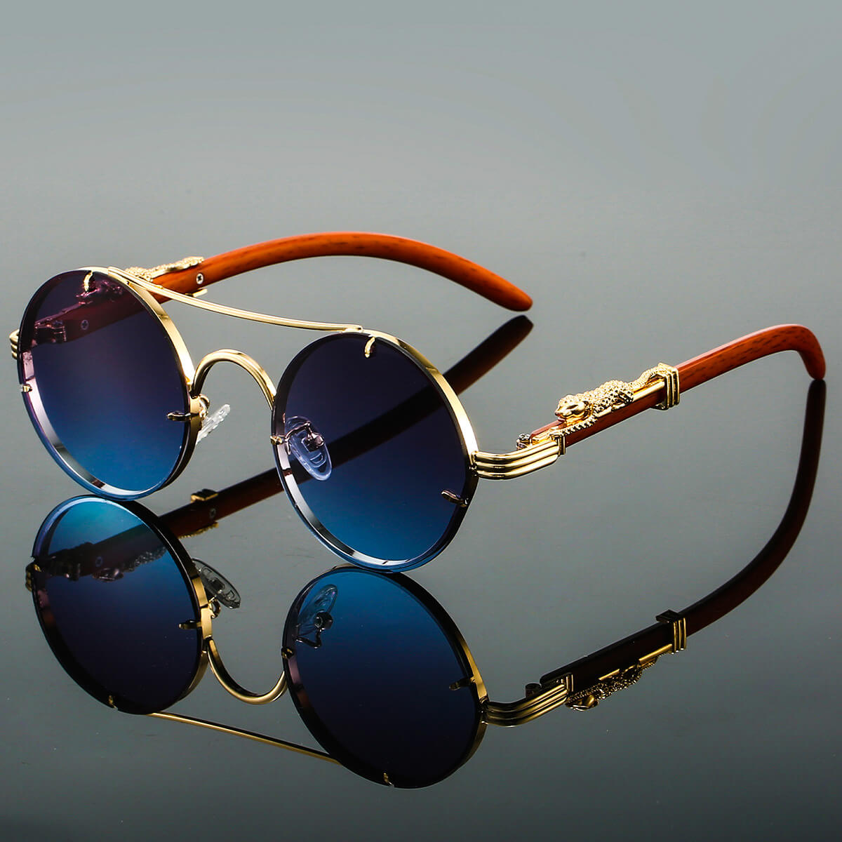 Unisexe Lunettes de Soleil Rondes Rétro avec Monture Dorée et Branches Décorées