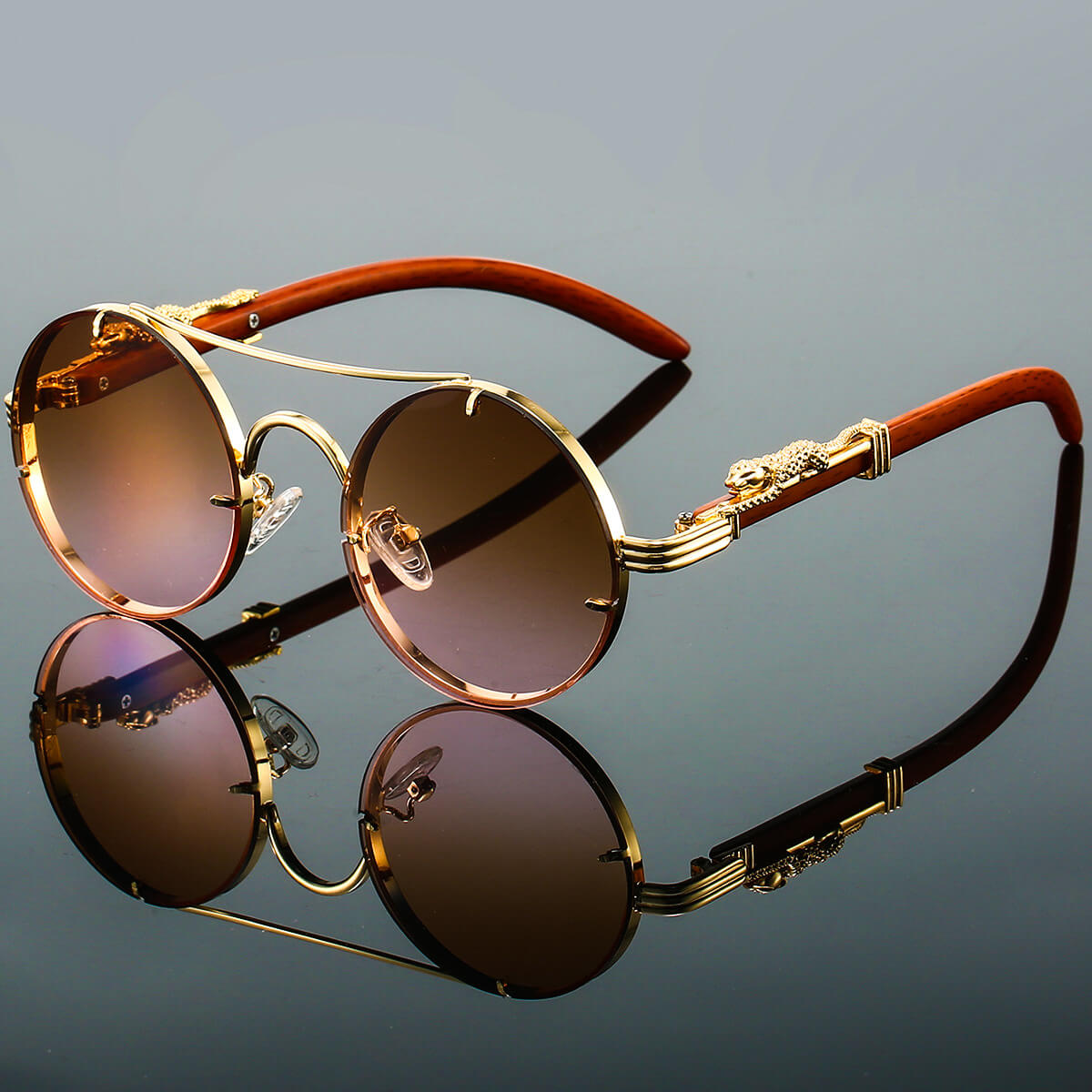 Unisexe Lunettes de Soleil Rondes Rétro avec Monture Dorée et Branches Décorées