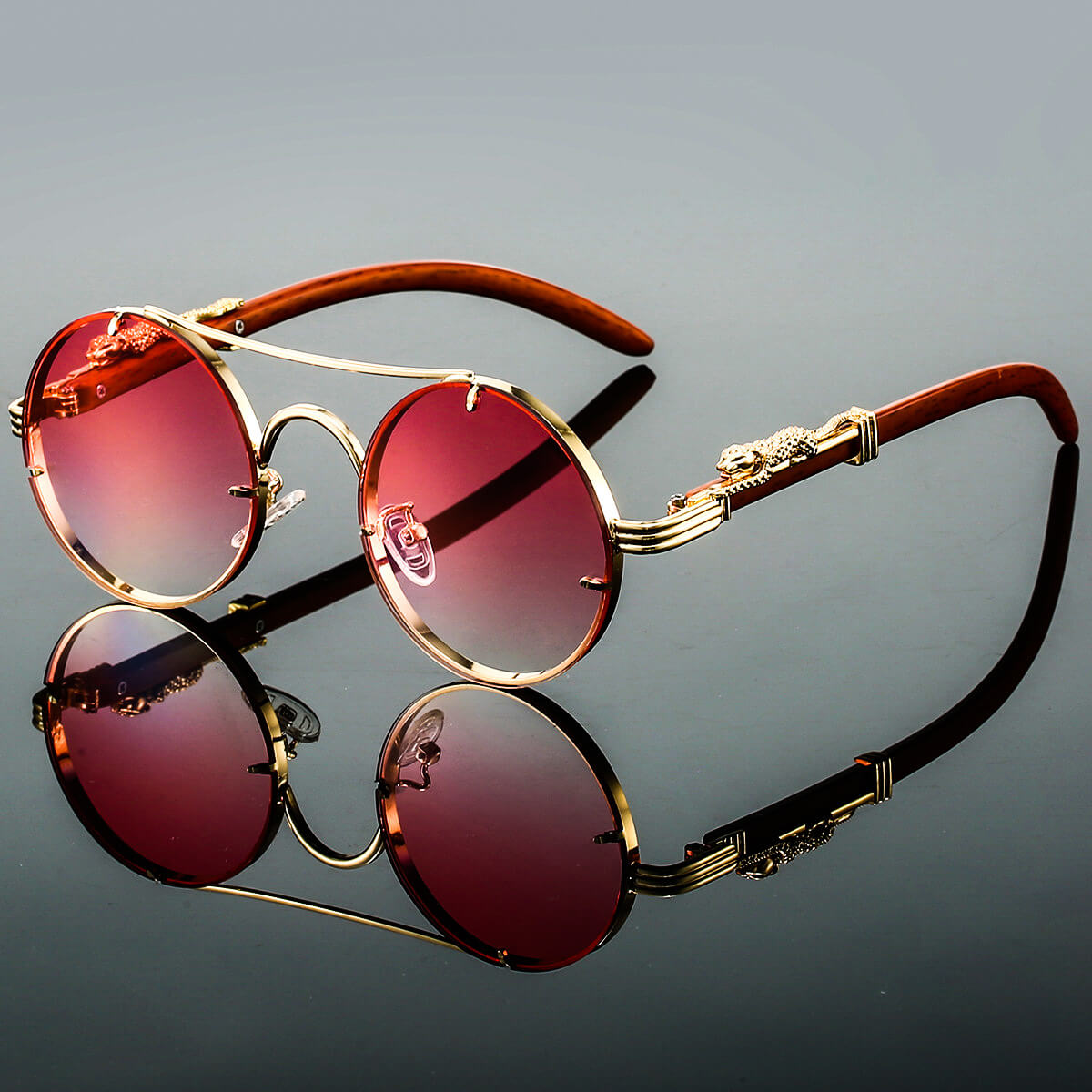 Unisexe Lunettes de Soleil Rondes Rétro avec Monture Dorée et Branches Décorées